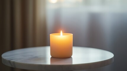 Single lit candle on smooth white marble table