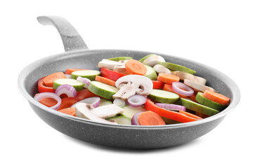 Frying pan with mix of fresh vegetables and mushrooms isolated on white
