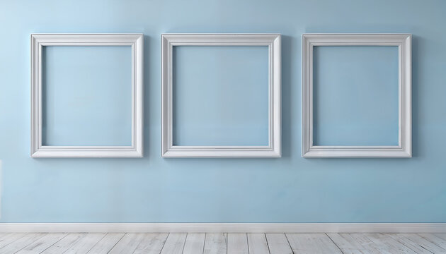 empty picture frames on blue wall