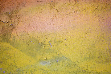 Obraz premium Yellow wall with peeling paint. Grunge effect texture.