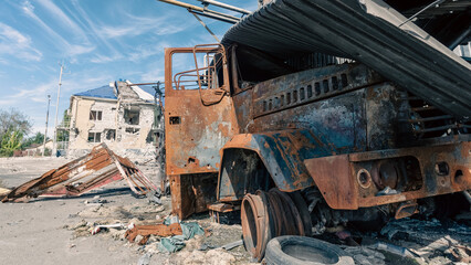 Fototapeta premium damaged and looted cars in a city in Ukraine
