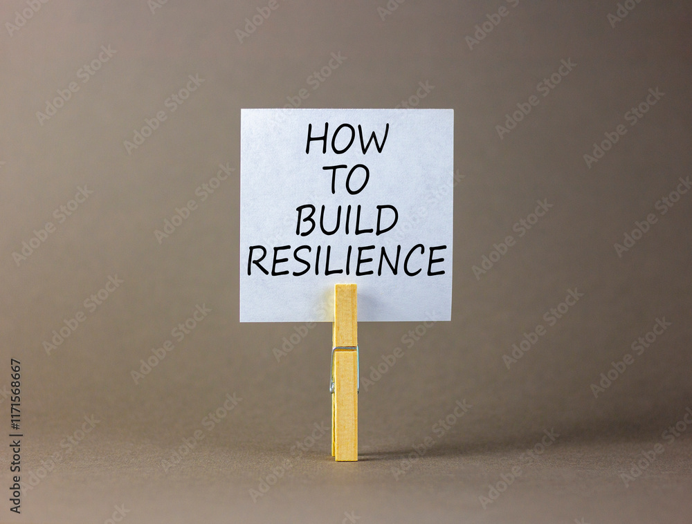 Aufkleber how to build resilience symbol. concept words how to build resilience on beautiful white paper on cl