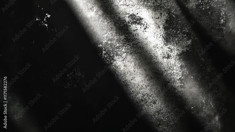 Poster light filtering through dark foliage creates an abstract pattern of shadows and textures on a forest