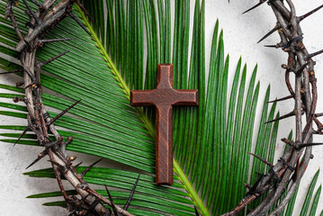 Palm Sunday. Crown of thorns, cross on palm leaf