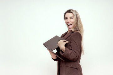 Fototapeta premium woman with a satisfied expression and laptop