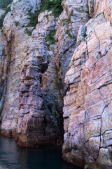 stone pillar and cliff at the seaside