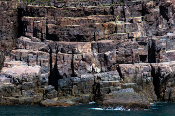 seaside cliff of sedimentary rock