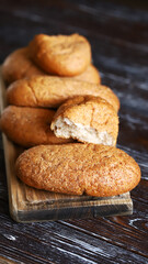 Fresh bran buns on a board