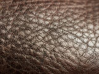 Textured leather macro background showcasing elegant lines and shades, ideal for stylish and luxurious designs