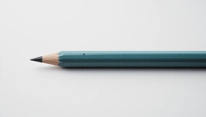 Single Teal Pencil on White Background, Close-Up Shot