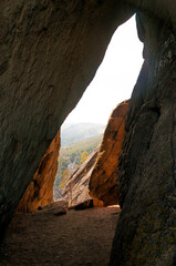 Red underground cave, corridor ceiling in hole of mountain