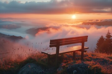 A serene sunset view from a wooden bench overlooking misty hills and valleys, evoking peace and reflection.