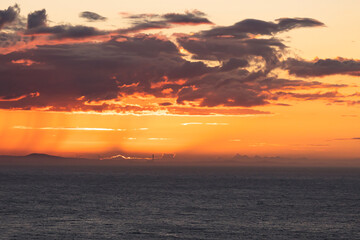 Naklejka premium Dramatic sky over the sea at sunset. Sardinia