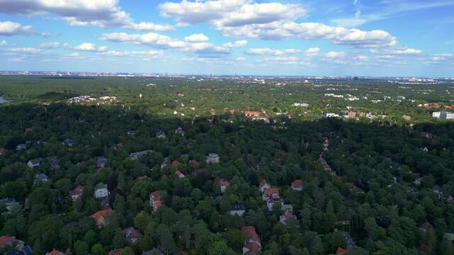 residential district green forest cloudy sky. Stunning aerial view flight drone
