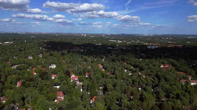 residential district green forest cloudy sky. Gorgeous aerial view flight drone