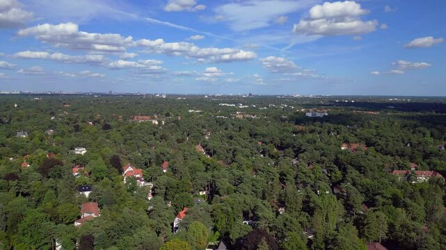 residential district green forest cloudy sky. Nice aerial view flight drone