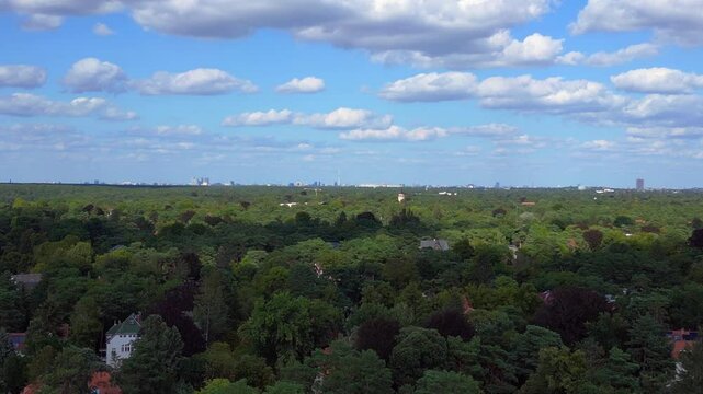 residential district green forest cloudy sky. Great aerial view flight drone