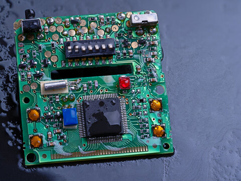 Drops of water on a board with electronic components.