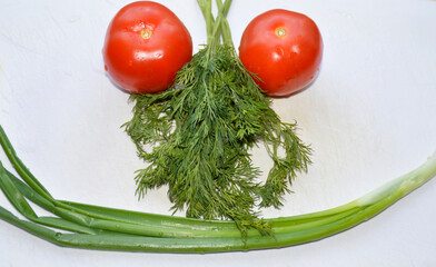 fresh vegetables, ingredients for salad on the kitchen board. ripe bell peppers, tomatoes, green onions and a small bunch of dill. proper nutrition. vegetarianism. diet and healthy lifestyle