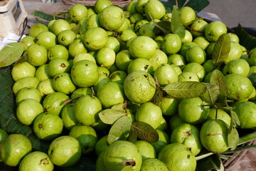 Fresh guavas kept in the basket for sale in the market