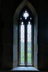 Obraz premium Medieval Gothic Window in Atmospheric Light