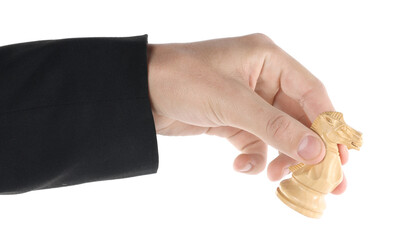 Man holding chess knight on white background, closeup. Competition concept © New Africa