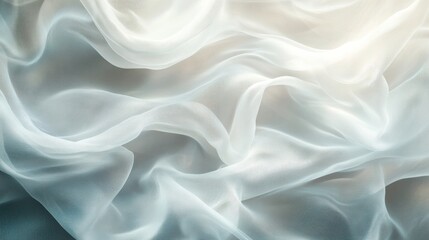 Obraz premium Soft, flowing white fabric drapes elegantly, creating a serene and dreamy mood.