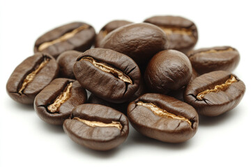 Obraz premium Coffee beans scattered on a white background, forming a rustic pattern with rich brown hues and textures, inviting the viewer to savor the aroma and flavor they represent.