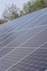Solar panels providing green energy on a cloudy day