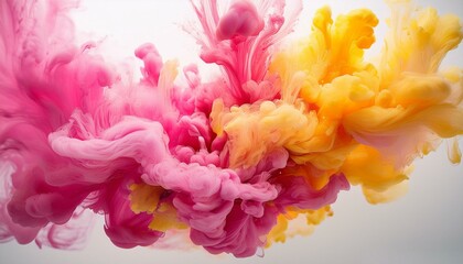 Obraz premium colorful ink clouds are swirling and mixing in water creating a mesmerizing abstract visual with vibrant hues of pink and yellow against a light background