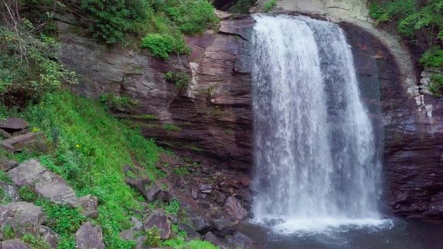 Slider action drone footage of Looking Glass Falls near Brevard and Asheville, North Carolina.