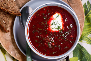 Traditional Ukrainian borsch with pampushki .style rustic