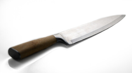 Sharp kitchen knife with wooden handle ready for culinary creation in a bright space