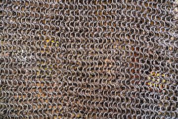 chain mail close up texture background. abstract iron ring backdrop. protection concept
