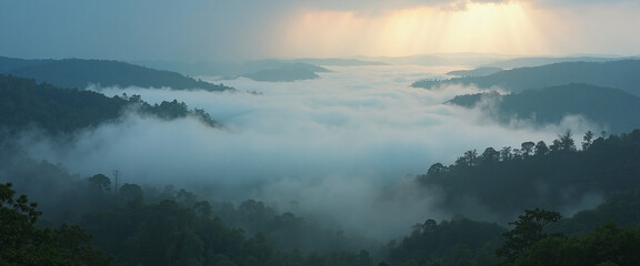 Majestic Landscape of Rolling Hills Shrouded in Mist with Dramatic Sunbeams Piercing Through Stormy Clouds