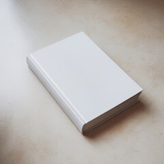 Fototapeta premium Softcover blank book with minimalist design on table