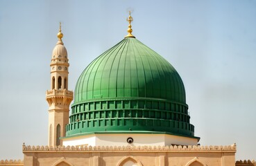 Large green dome, beige minaret of mosque in Medina Saudi Arabia. Religious building architecture. Islamic landmark. Clear sky. Peaceful scene. Historical monument. Cultural site. Tourism attraction.