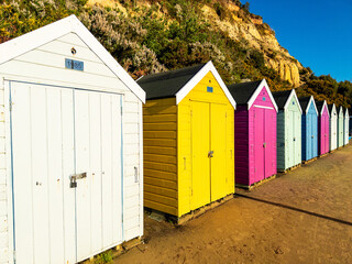 Colorful Beach Huts on Bournemouth Beach at Sunset