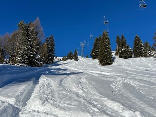 2persons Chairlift (fixed-grip), Chairlift at the ski resort over the Davos - Canton of Grisons,...