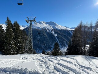 2persons Chairlift (fixed-grip), Chairlift at the ski resort over the Davos - Canton of Grisons,...