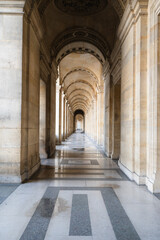 symmetrical arches pathway in an old building