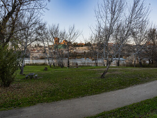 Naklejka premium Walk along the Duero River as it passes through Zamora. View of the cathedral in the background. Zamora. Castilla y León. Spain