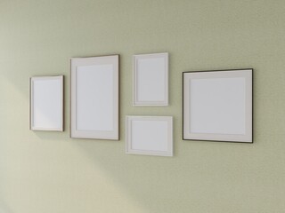 Mockup of various frames on a green wall with horizontal image orientation. 3D rendering, interior...