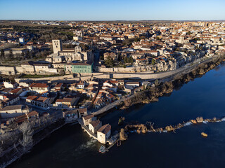 Aerial photo of the city of Zamora. View of the cathedral, stone bridge, Olivares water mills and...