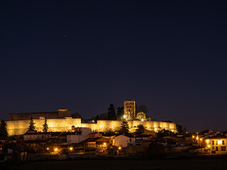 Night photo of the back of the castle and the illuminated San Salvador Cathedral. Zamora. Castilla y León. Spain