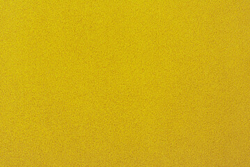 Yellow suede background. Texture of suede leather dyed in light yellow color.