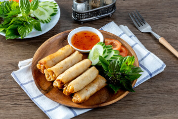 Spring rolls are a large variety of filled, rolled appetizers or dim sum found in East Asian and Southeast Asian cuisine