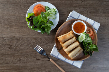 Spring rolls are a large variety of filled, rolled appetizers or dim sum found in East Asian and Southeast Asian cuisine