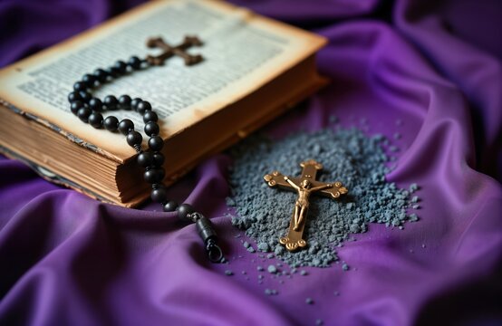 Religious items placed on violet fabric. Ash Wednesday concept. Old bible open with rosary on top. Crucifix, ashes on violet fabric. Holy day symbol. Lent, easter concepts. Religious prayer. - Powered by Adobe