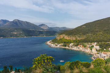 Scenic view at the picturesque coastal village with turquoise colored water in springtime, Limeni, Mani, Peloponnese, Greece